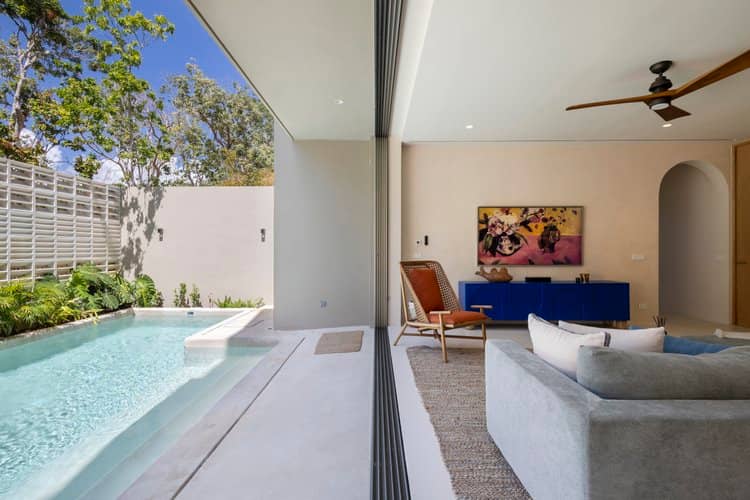 Indoor-outdoor pool representing the cenote-style experience near La Veleta