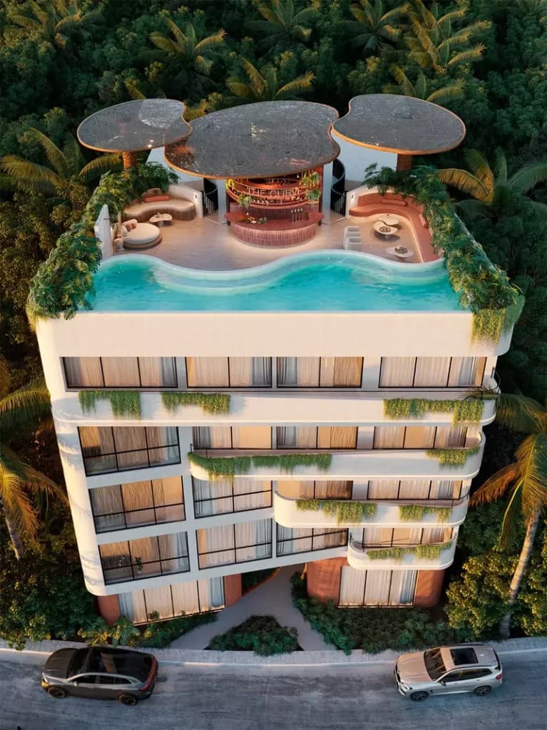Aerial view of The Curve rooftop pool and bar in Tulum