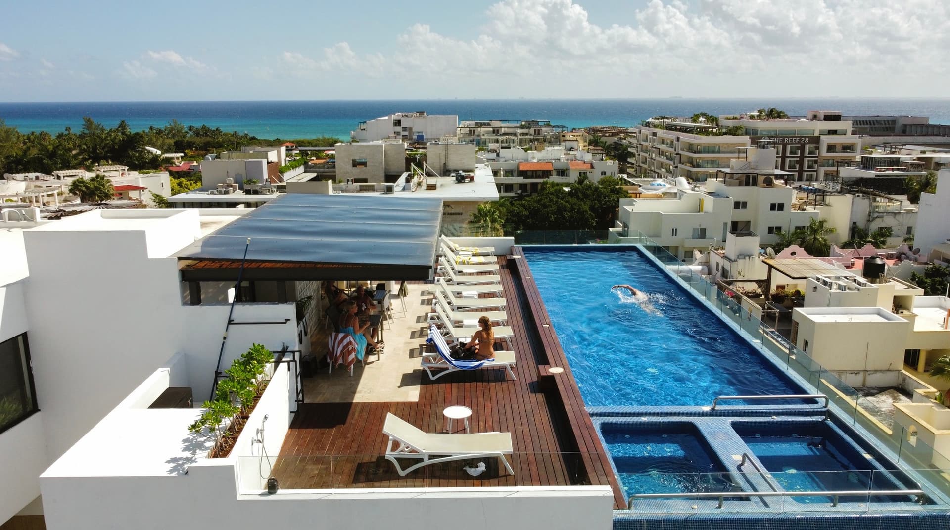 Rooftop pool and ocean view — amenity photography for the listing