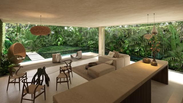 Open-plan living at Artia opening to a private pool deck and jungle